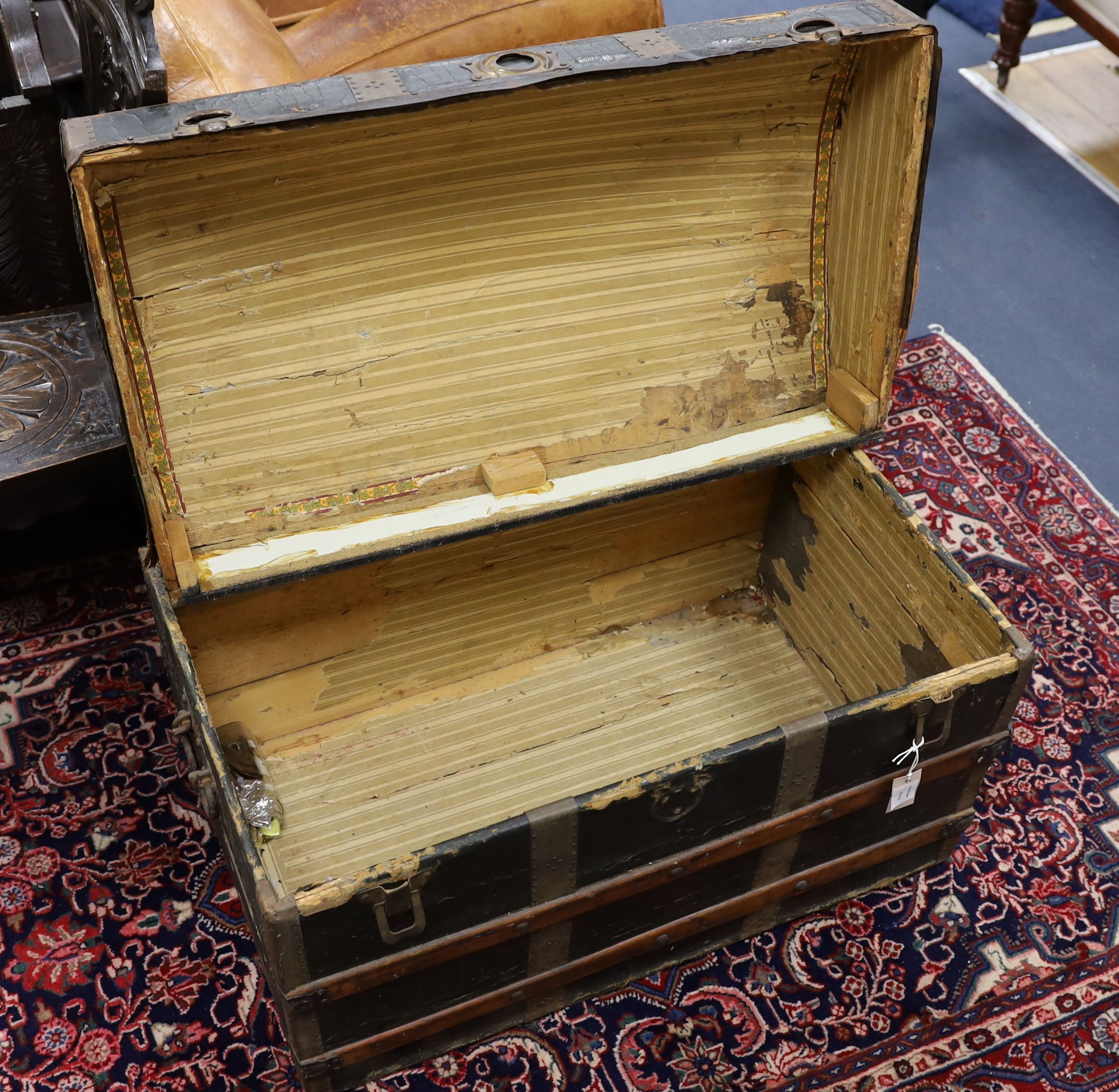 A late Victorian wood bound domed camphorwood and canvas covered trunk, length 85cm, depth 50cm, height 59cm